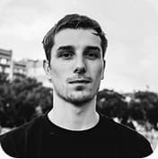 Black and white portrait of an Illume designer.